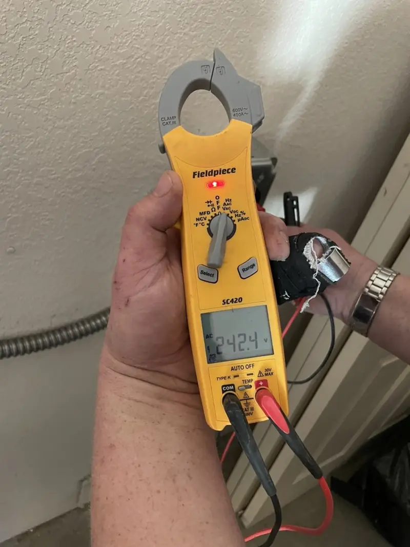 Voltage testing with clamp meter during Circuit Breaker Repair in Bushland